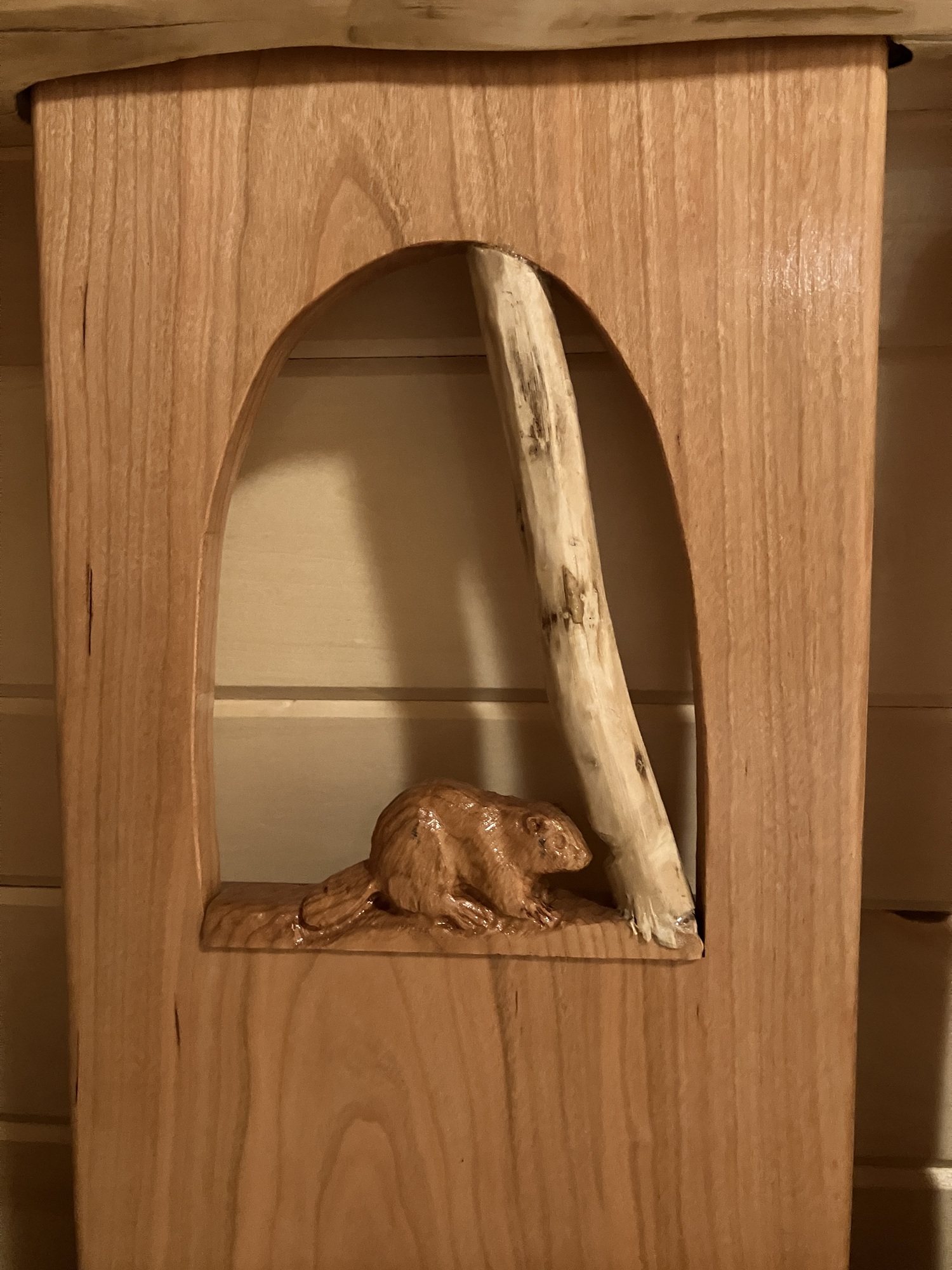 Close-up of beaver carving showing detail and depth in woodwork