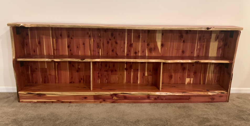 Front view of the aromatic red cedar bookshelves showing both shelves and slatted back