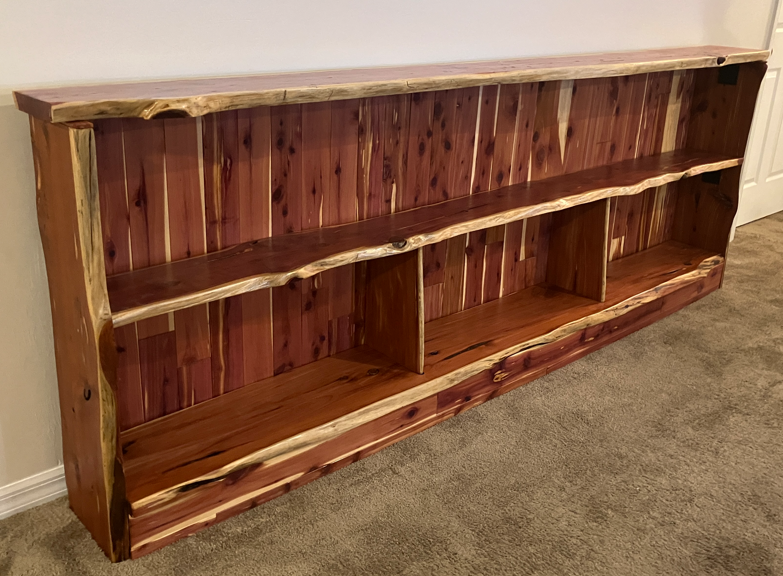 Left-side view of the aromatic red cedar bookshelves indoors
