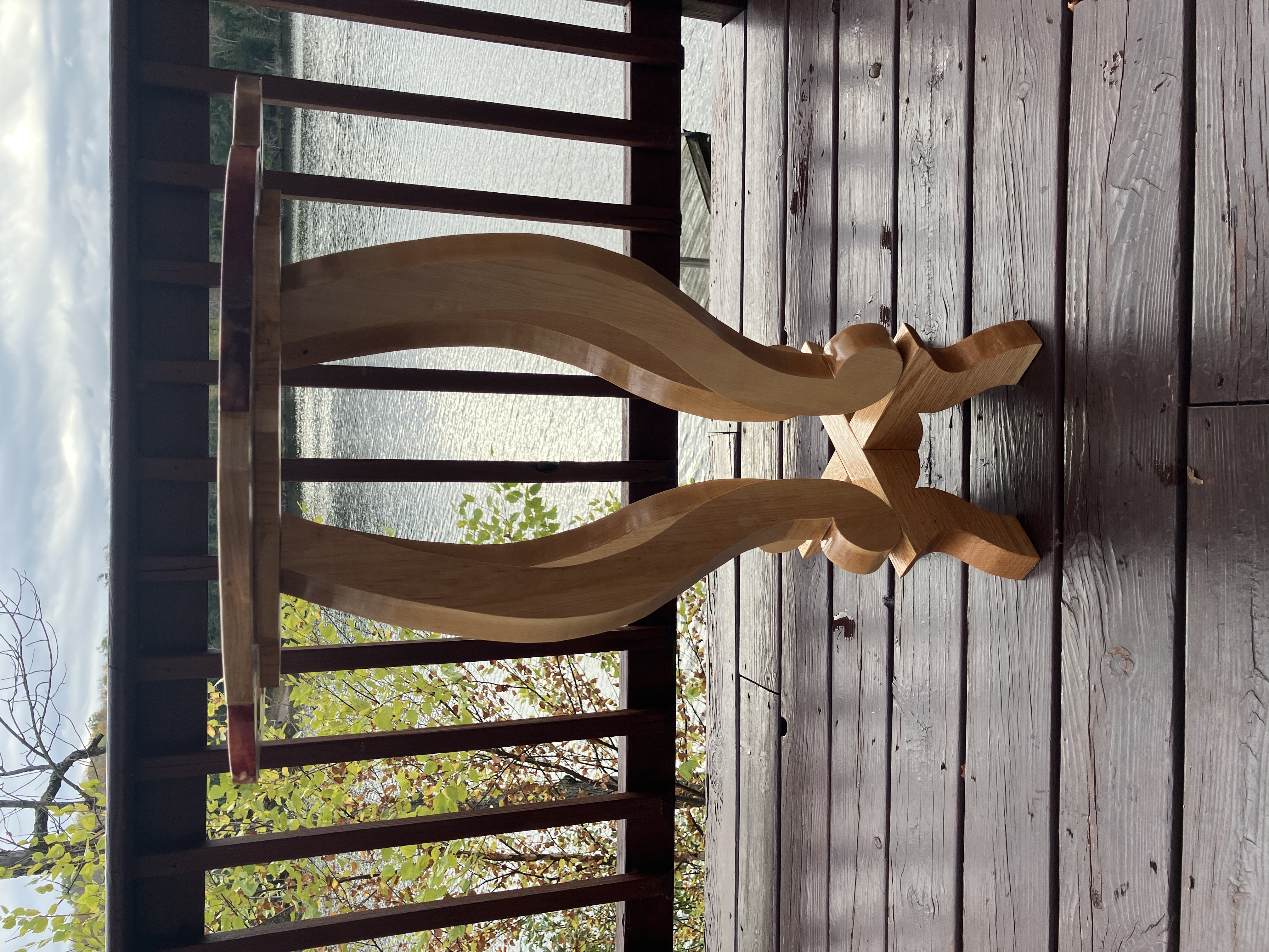 Side view showing exquisite leg curvature and stability of the table