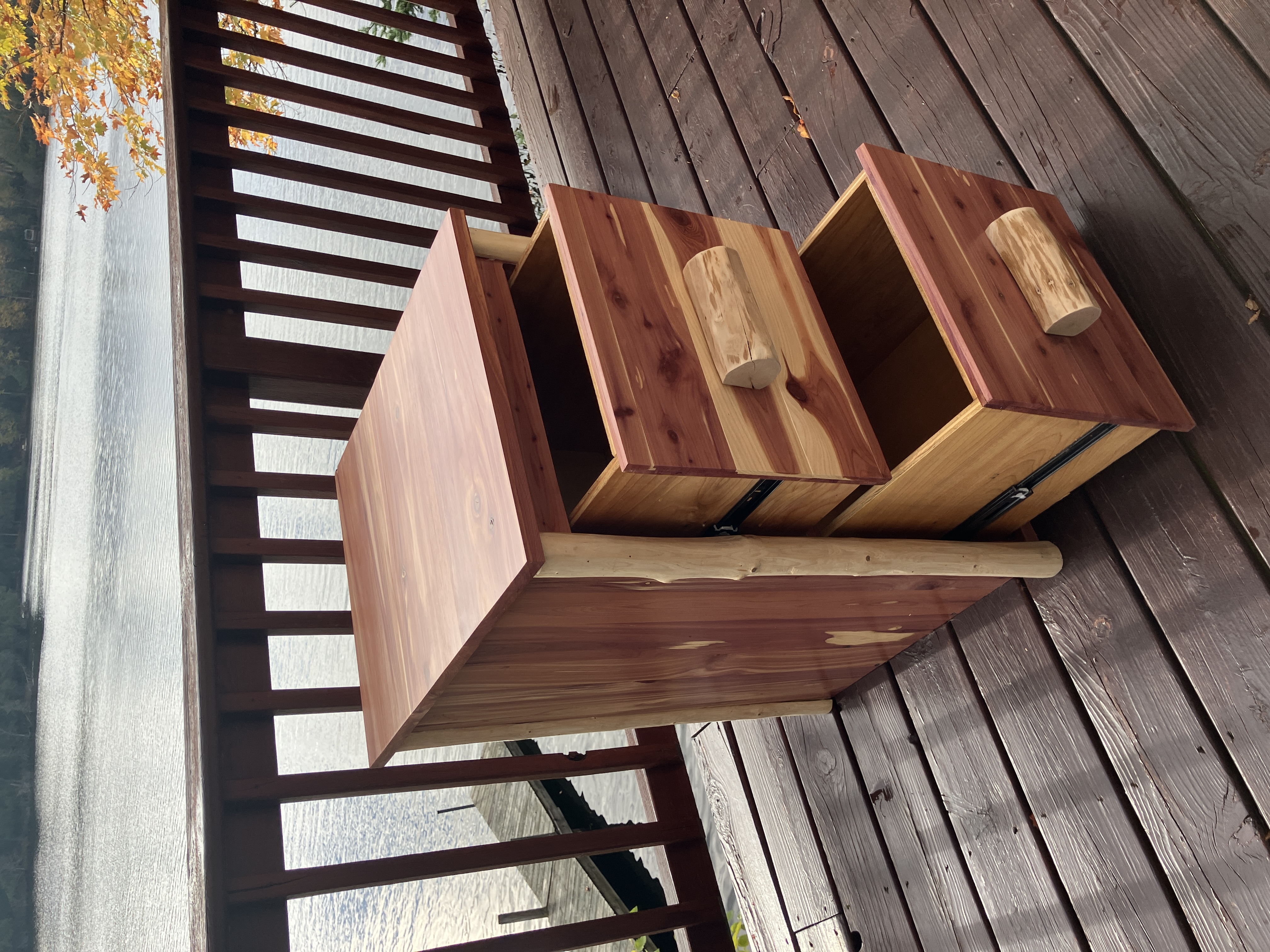 Left view of red cedar file cabinet with open drawers