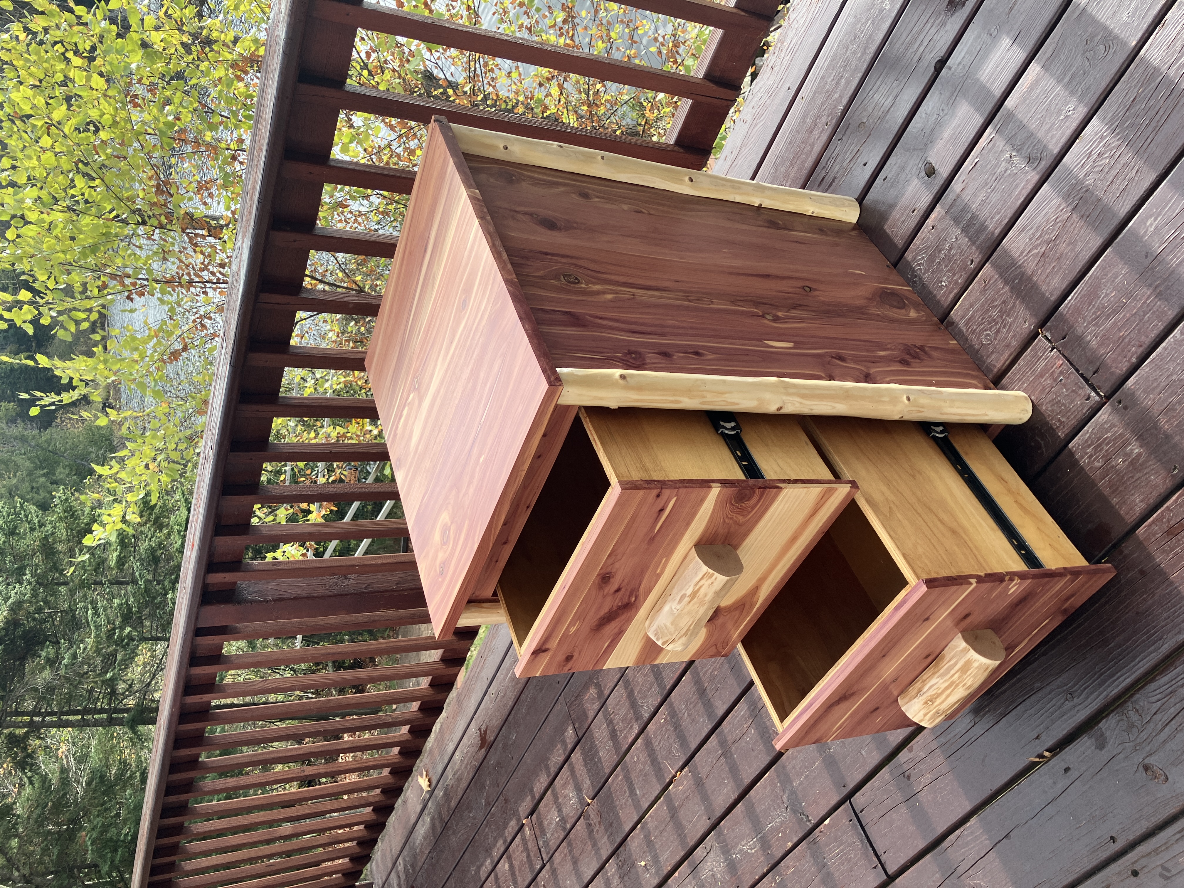 Right view of red cedar file cabinet with open drawers