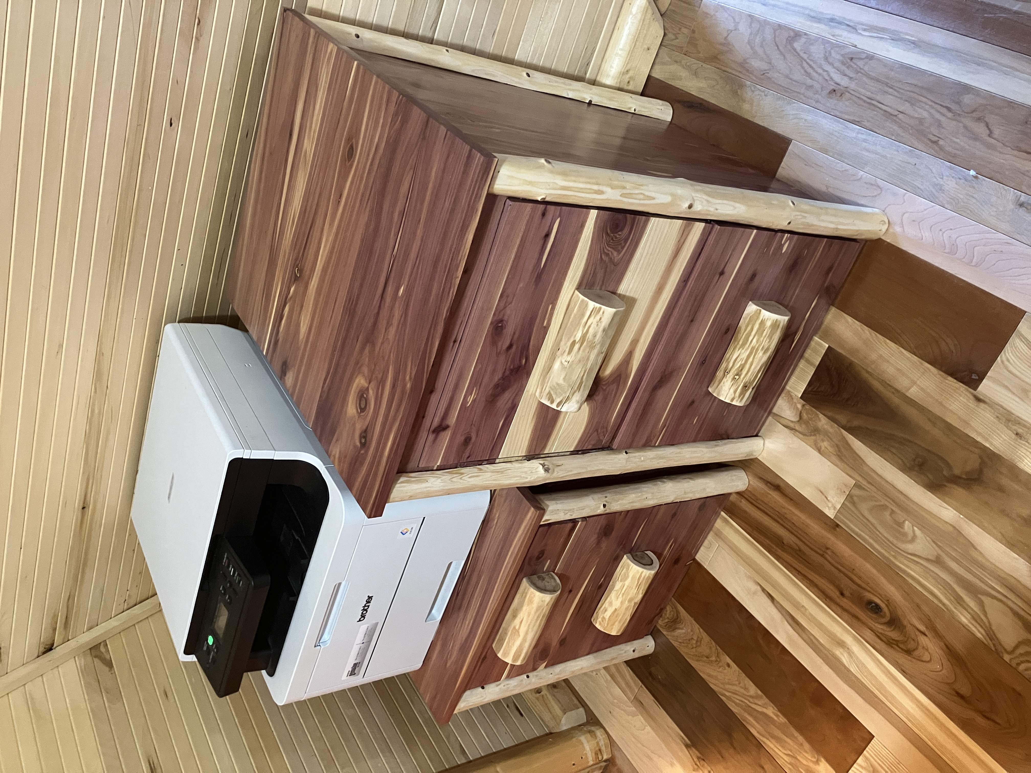 File cabinet and printer table cabinet in cabin setting