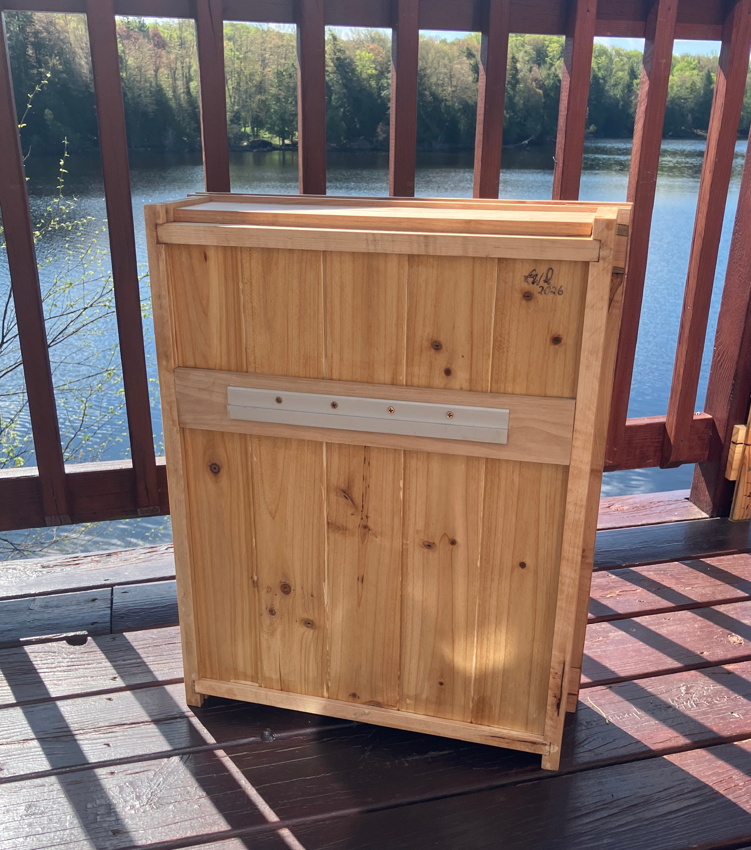 Back view of handmade medicine cabinet showing wall bracing