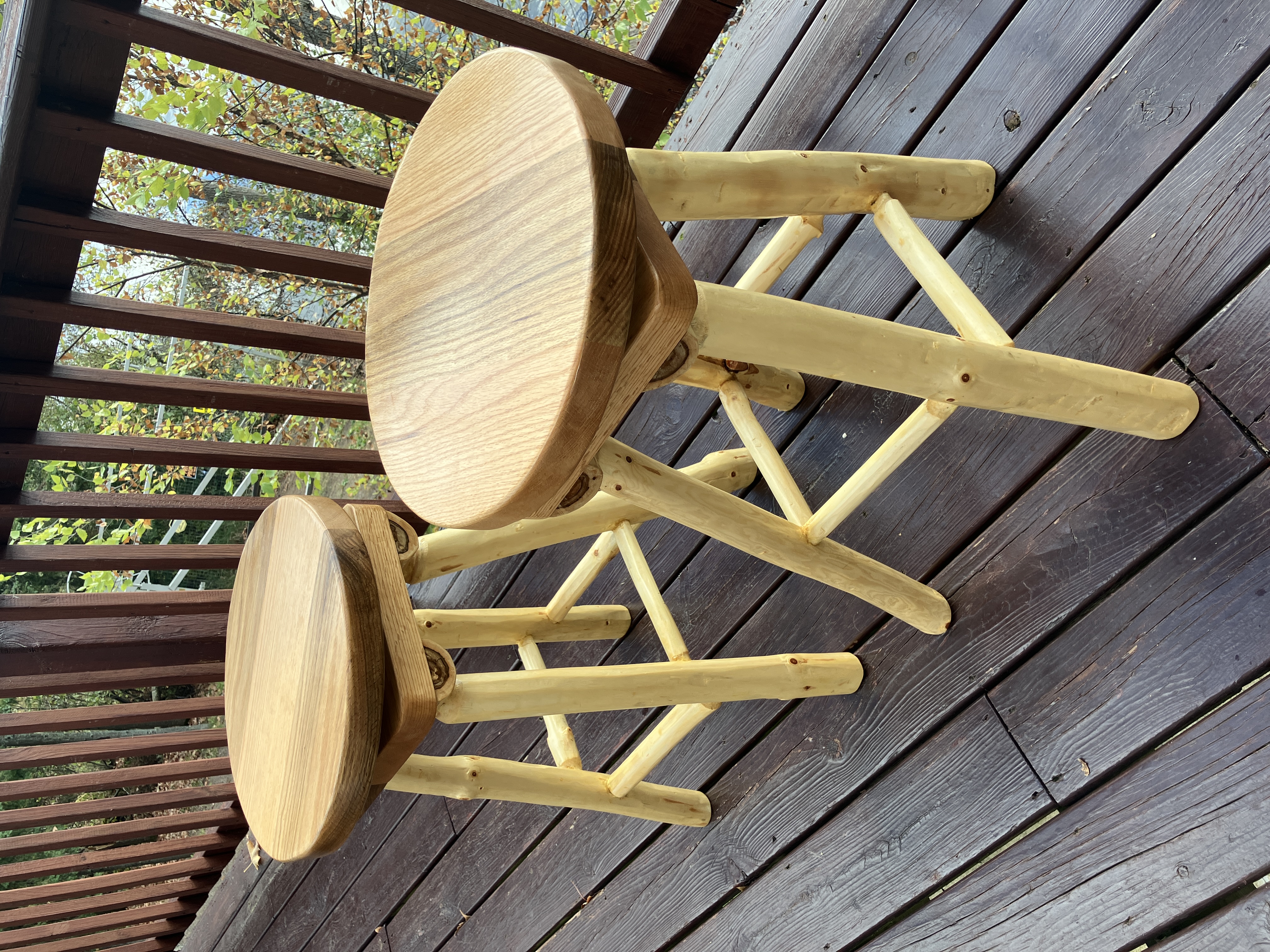 Pair of swivel log stools